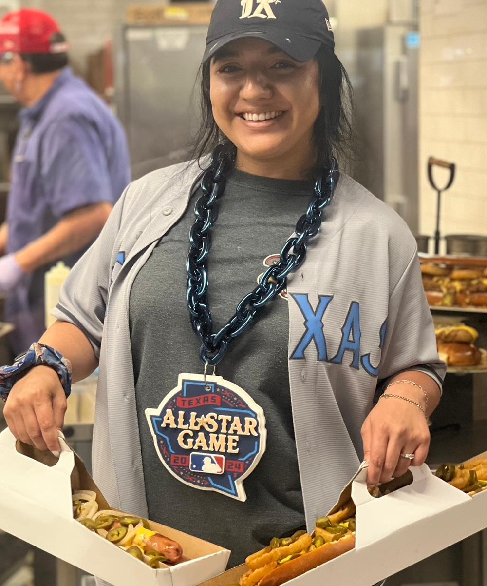 I might be biased, but this is home. I grew up in Arlington and the city continues to grow. Sometimes I want to preserve that city and keep it as small and cozy as it was when I was first growing up. The way the city has boomed and grown around the ballpark itself tells you what the Ballpark experience alone is like. It’s home to the 2 foot long hotdog, some of the best barbecue you’ll find in the state of Texas and traditions that were carried over from the old Ballpark across the sidewalk. ￼